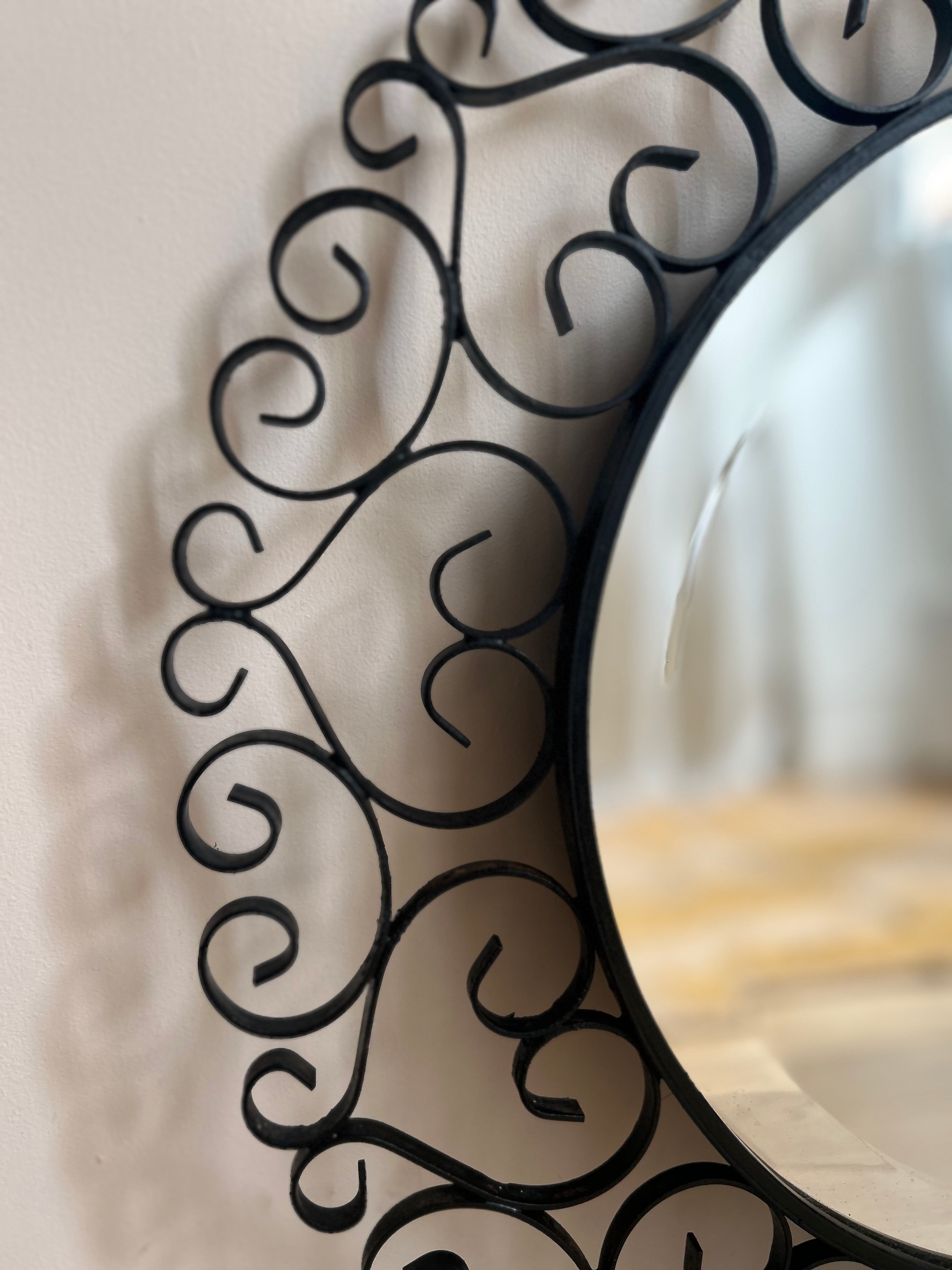 Miroir rond biseauté en fer forgé