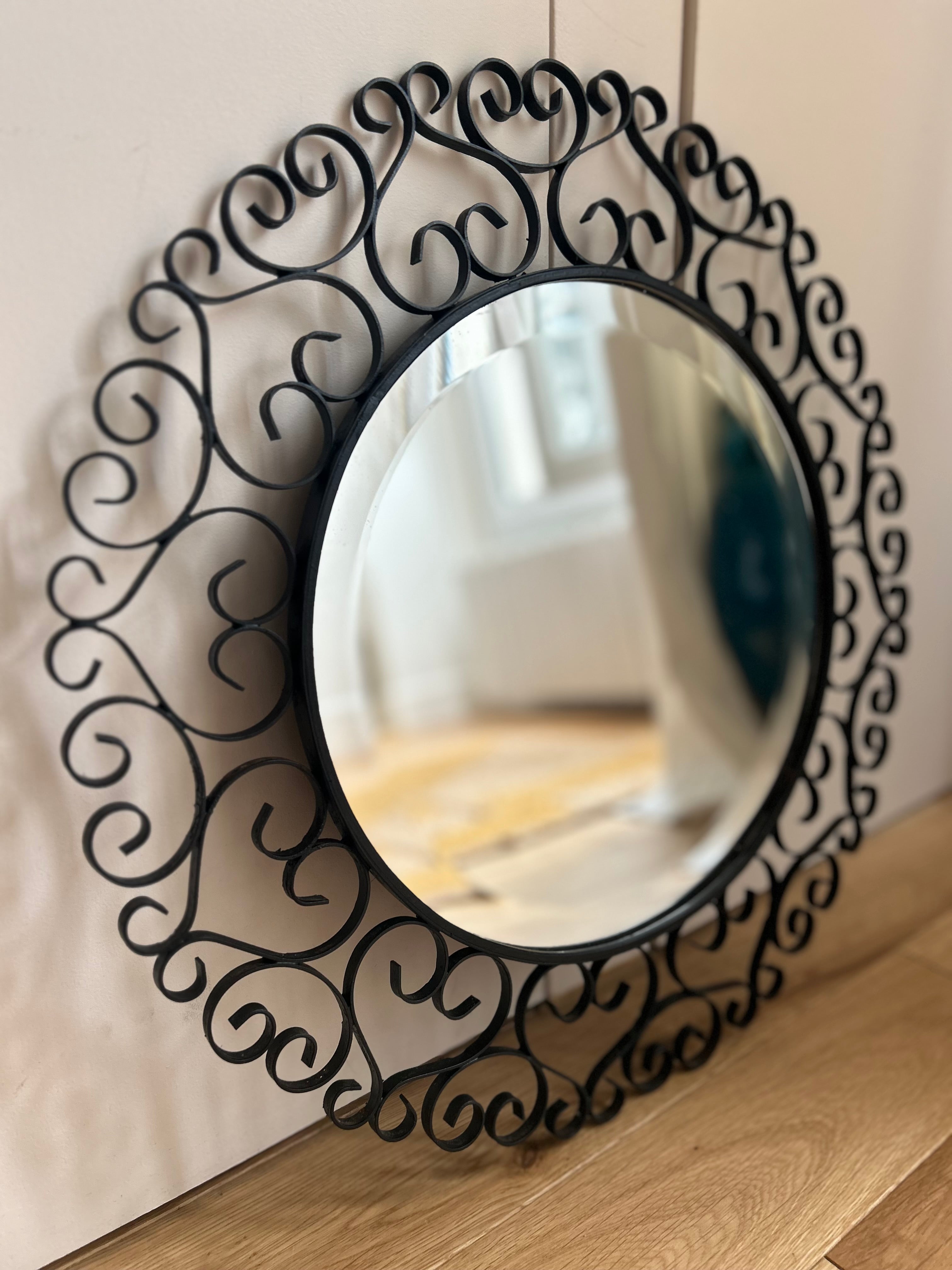 Miroir rond biseauté en fer forgé