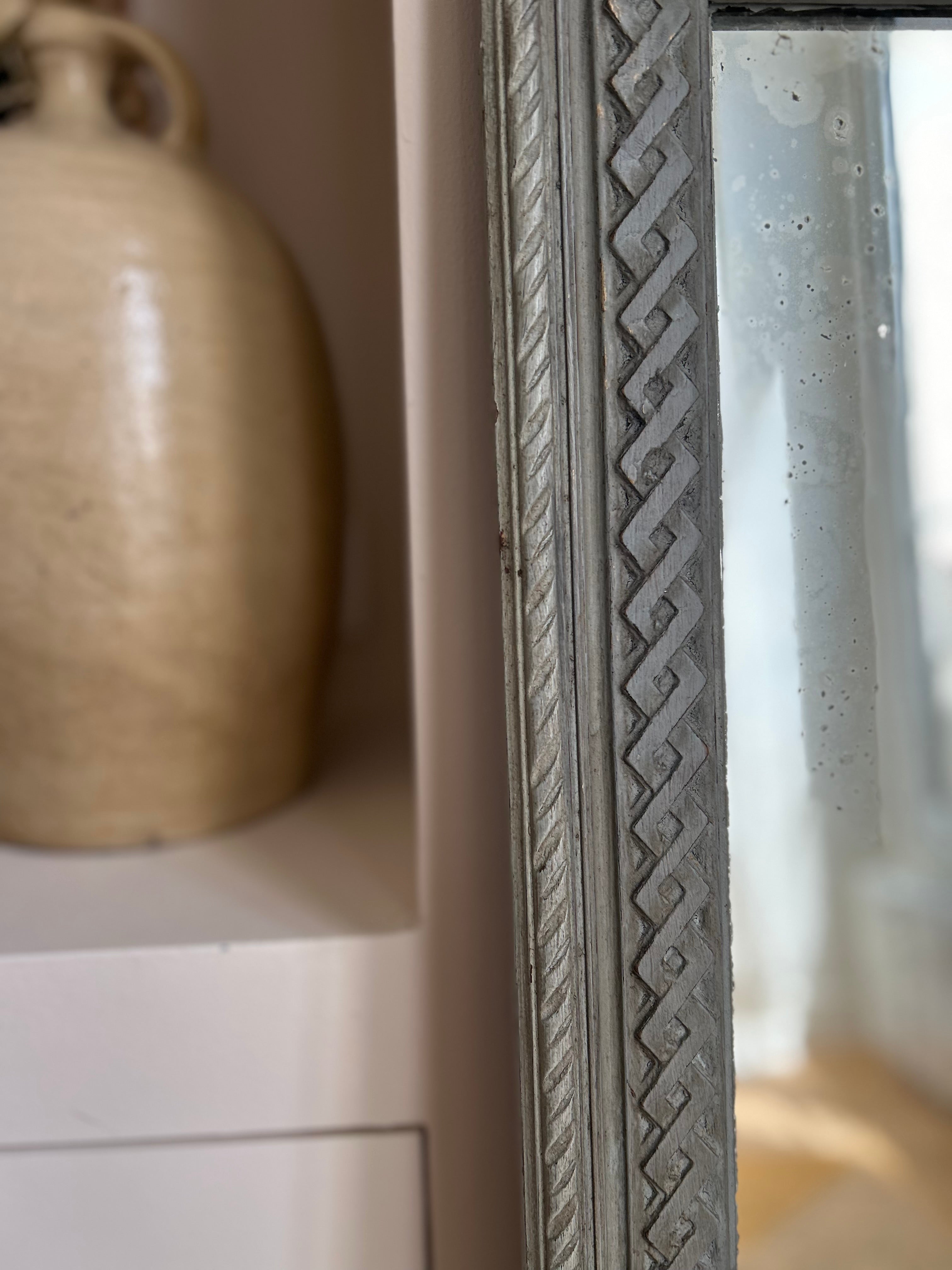 Grand miroir rectangulaire, bois sculpté